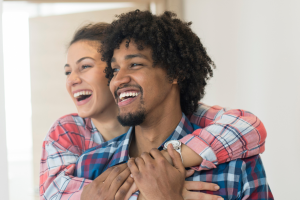 couple in relationship therapy smiling